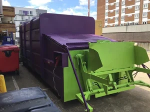 Portable waste compactor close-up. Provided to a shopping centre client.