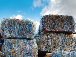 A large stack of baled plastic bottles.